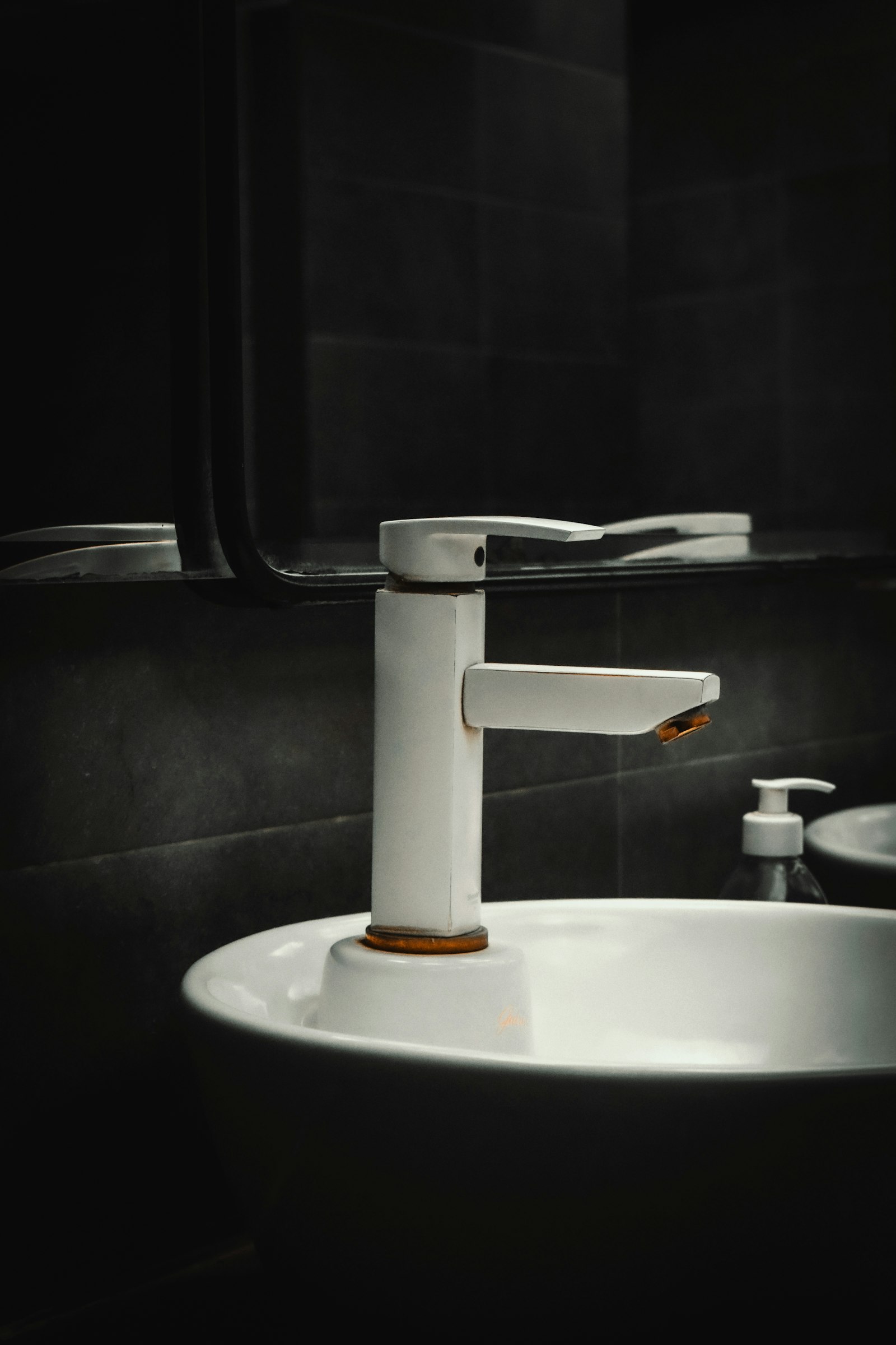 A modern bathroom faucet and sink basin